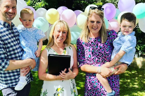 Celebrant Karen Dapson with family at a naming ceremony